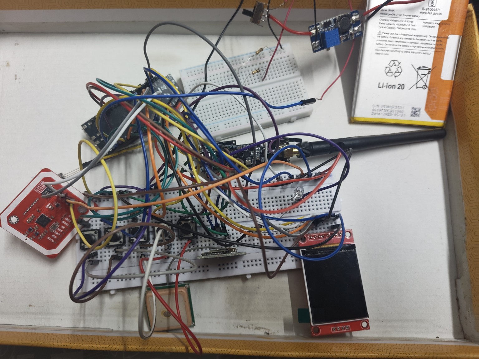 Breadboard prototype with ST7735 1.8-inch TFT display mounted alongside ESP32-S3