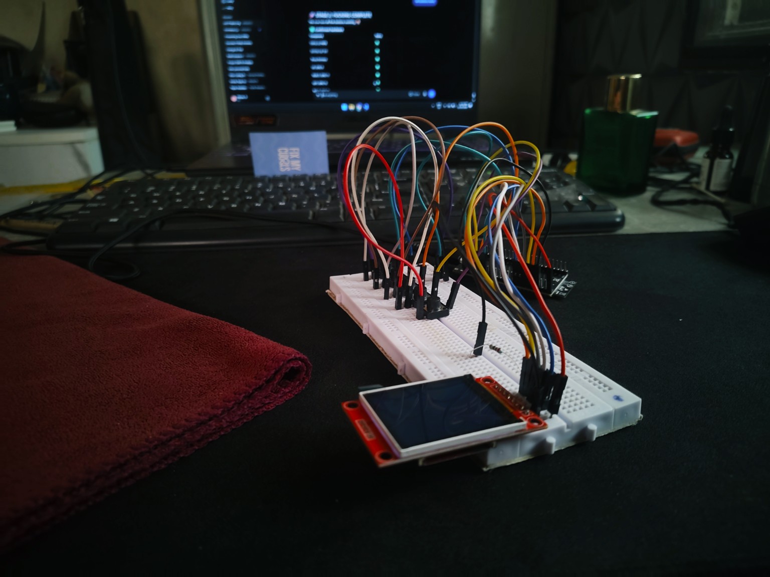 Live Bruce v2 Main Menu operating on the physical display, navigated via the 5-button matrix