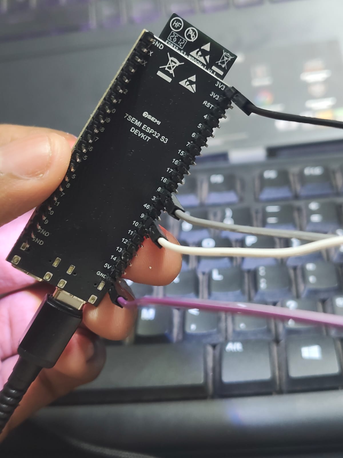 Underside pin inspection of the 7Semi ESP32-S3 showing I2C pin connections
